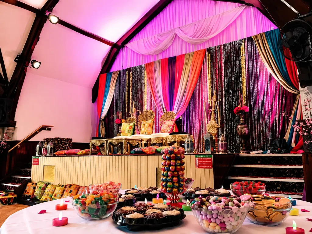 Decorated celebration stage at Queen Street Halls for weddings and cultural events in Dundee.