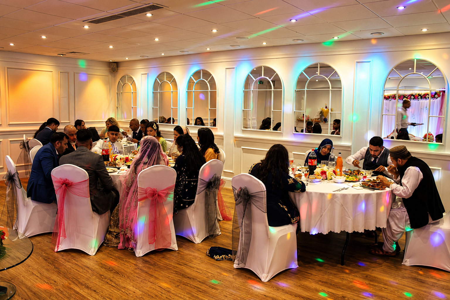 Guests enjoying a private celebration in the elegant banquet room at Queen Street Halls, Broughty Ferry, Dundee.